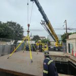 The Walker Brothers team uncovering an access point to an underground substation.