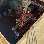 Preparing to lift equipment out of the substation using a crane.